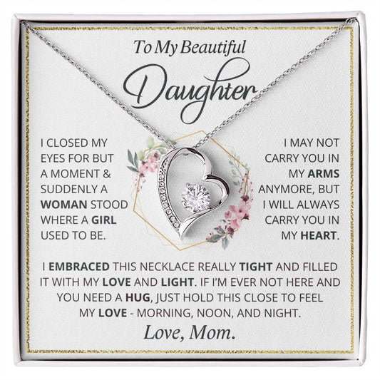 Gift for daughter from Mom - Love Knot Necklace. Heart pendant with message card 'I will always carry you in my heart' and a luxury mahogany-style LED light gift box.